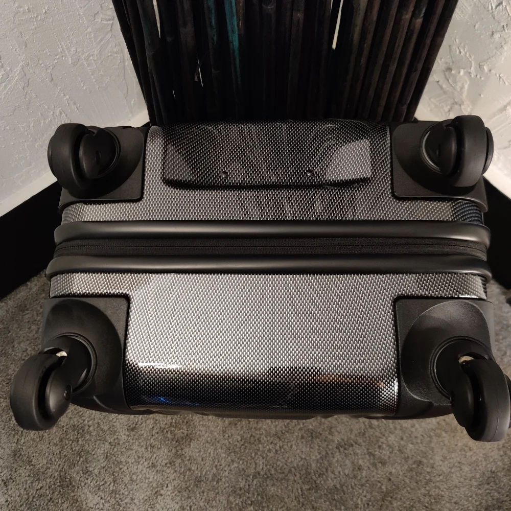 Tumi •upgrade your